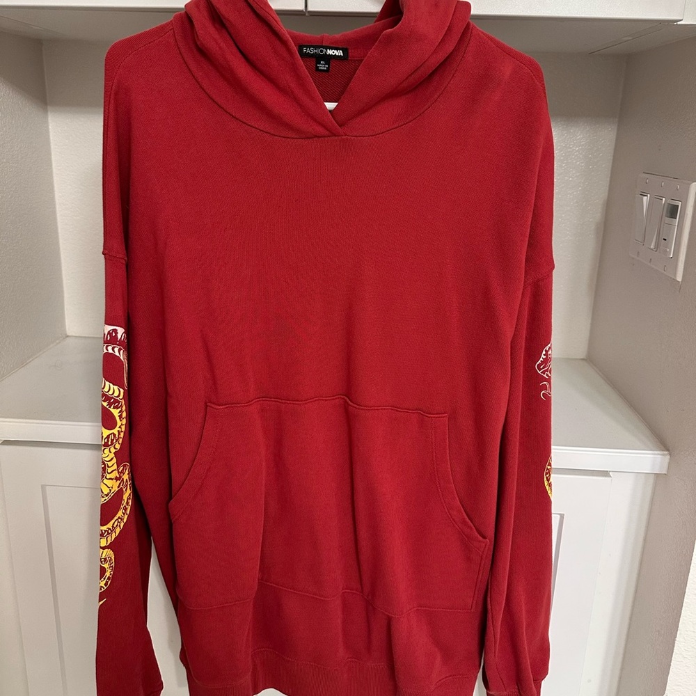 Women’s Fashion Nova hoodie w/ design on sleeves